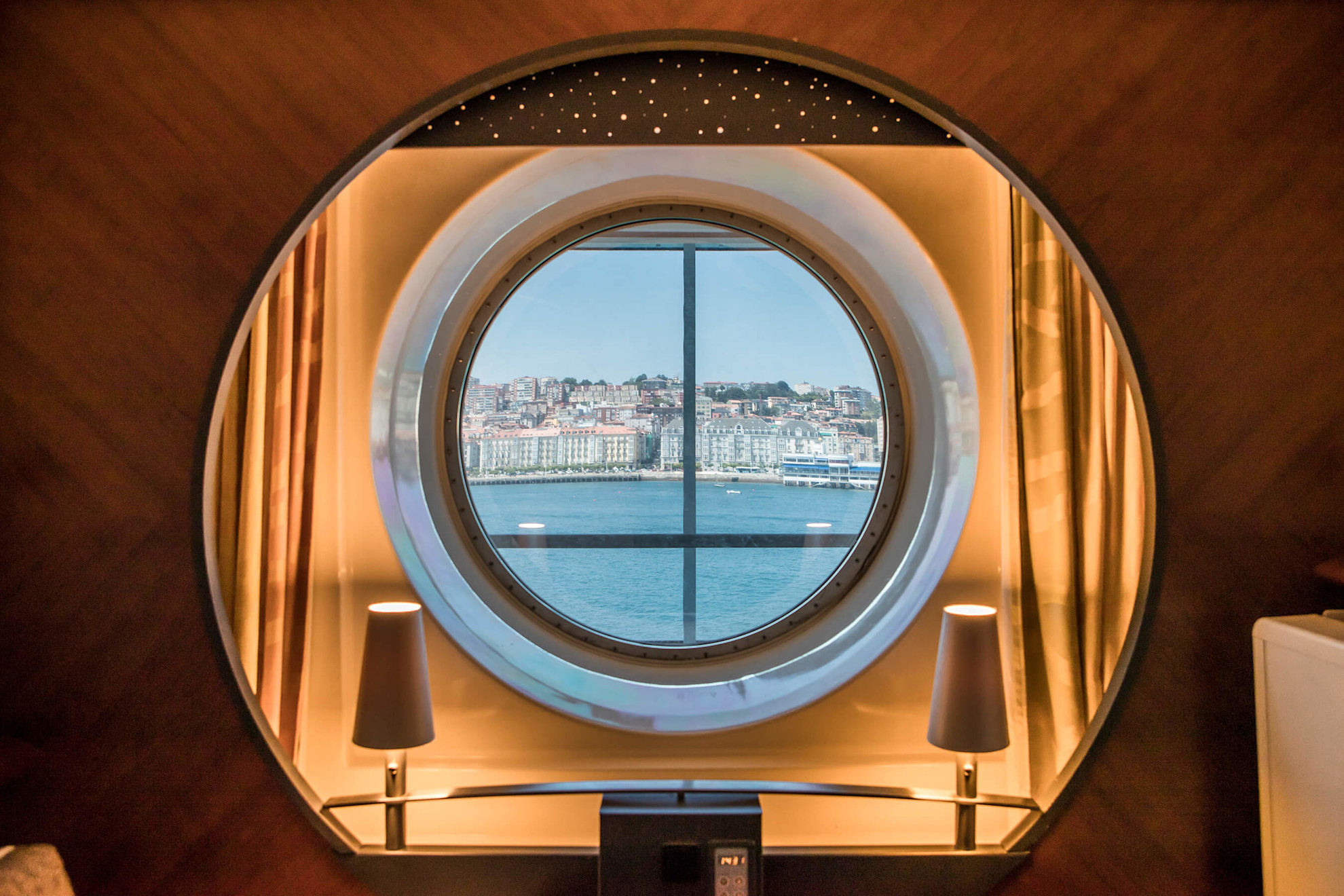 Looking through a port-hole from the inside of a cabin