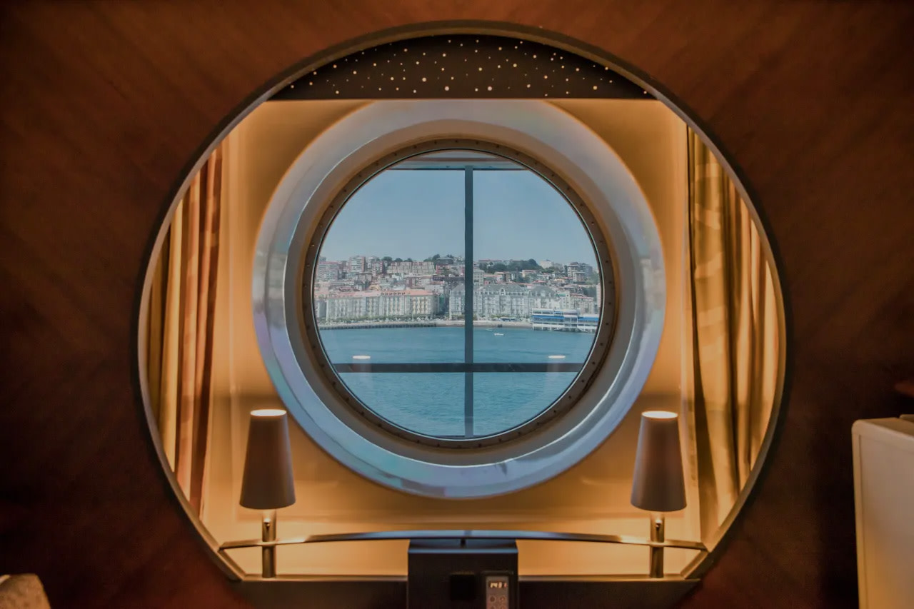 Looking through a port-hole from the inside of a cabin