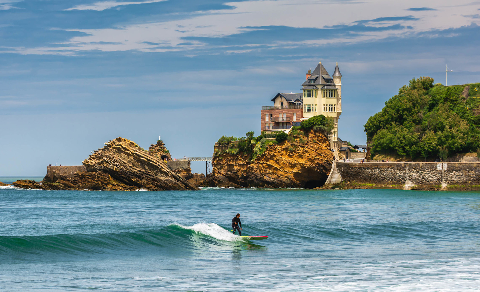 Surfing with a view of Villa Belza in Biarritz