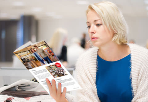 Woman reading a magazine
