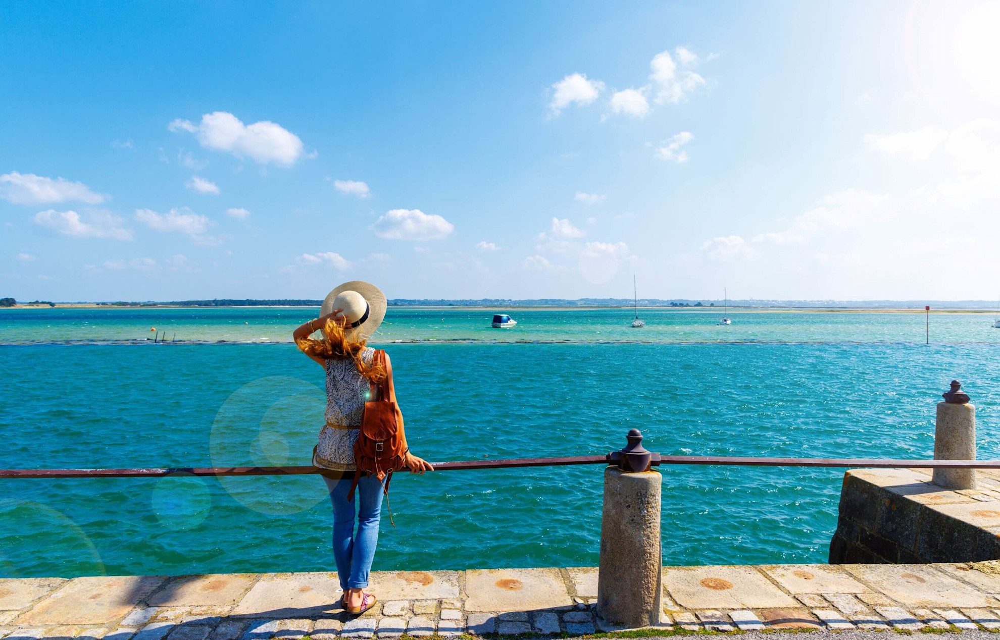 Woman looking out over Altantic coast at Le Croisic, Pays de la Loire, Loire Atlantic