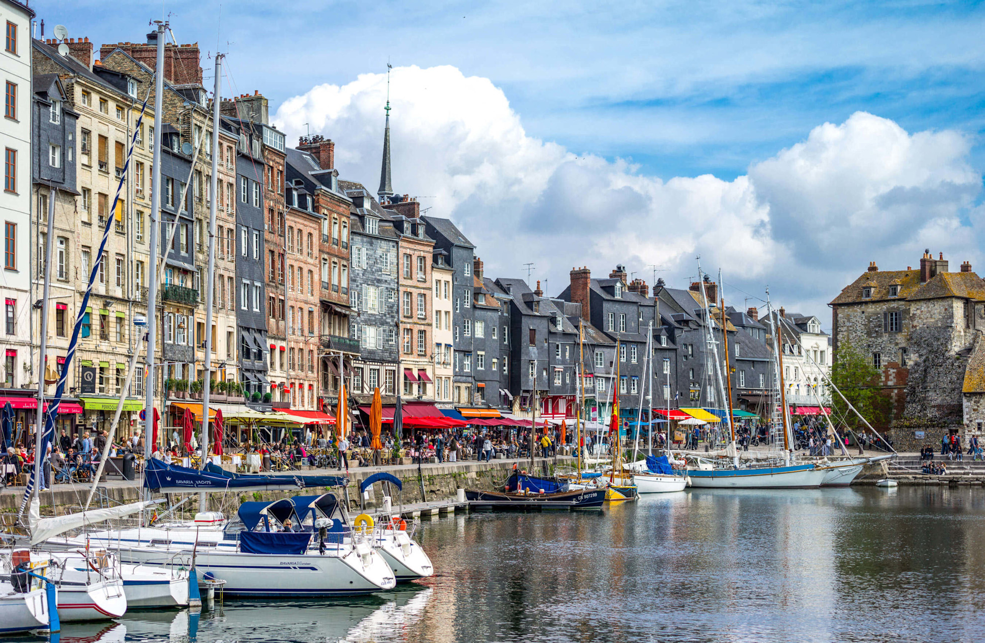 Pretty seafront houses and marina in Honfleur © Shutterstock